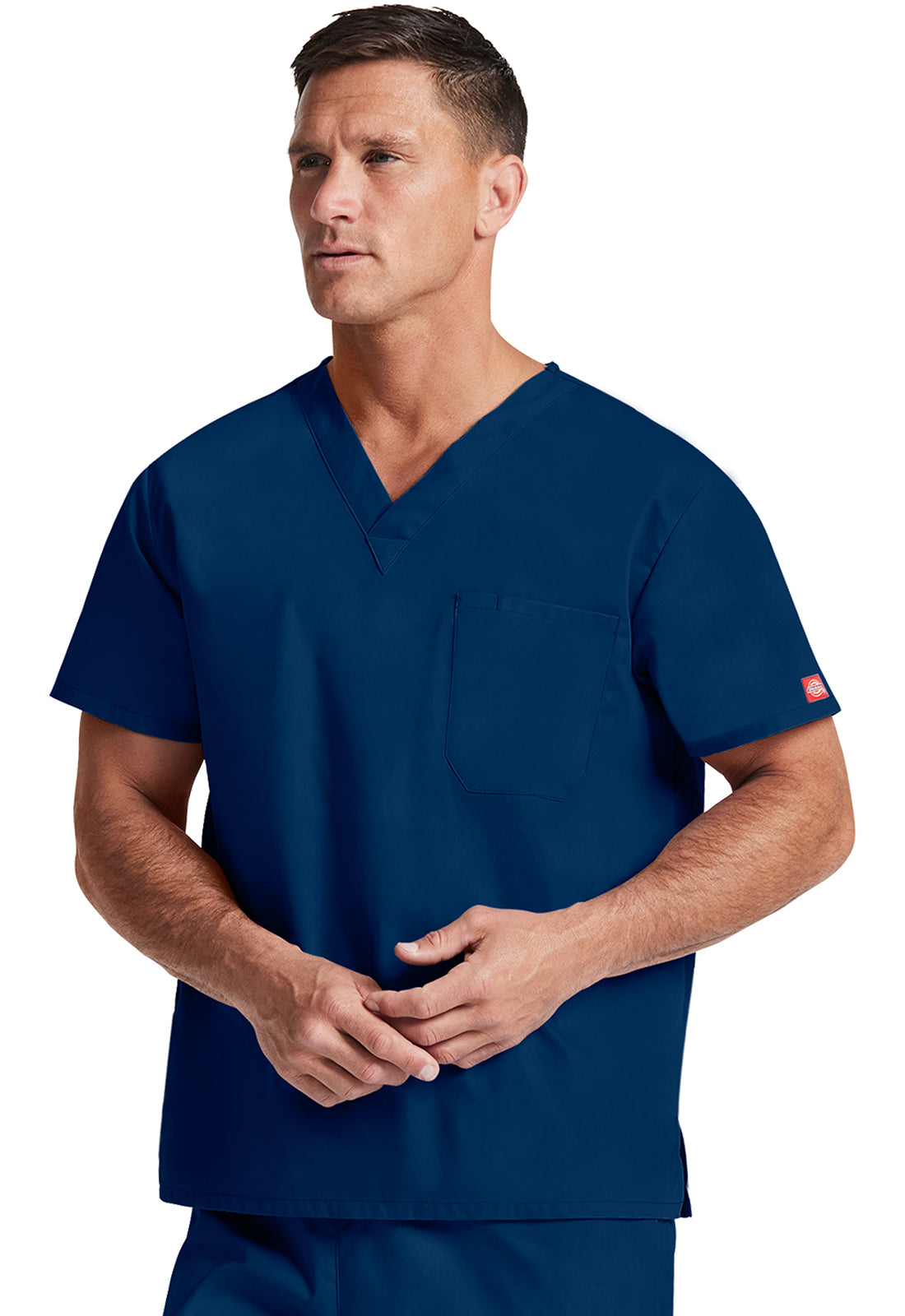 Unisex top met V-hals die in de broek gedragen kan worden met borstzak en zijsplitten