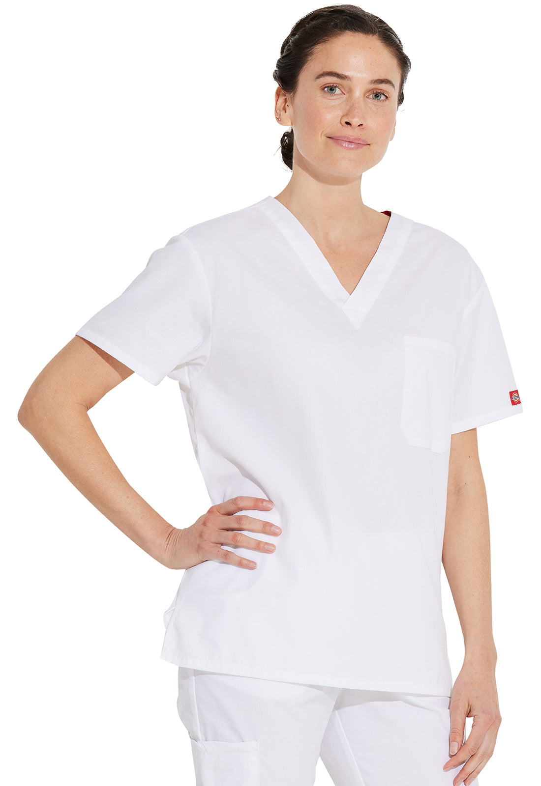 Unisex top met V-hals die in de broek gedragen kan worden met borstzak en zijsplitten