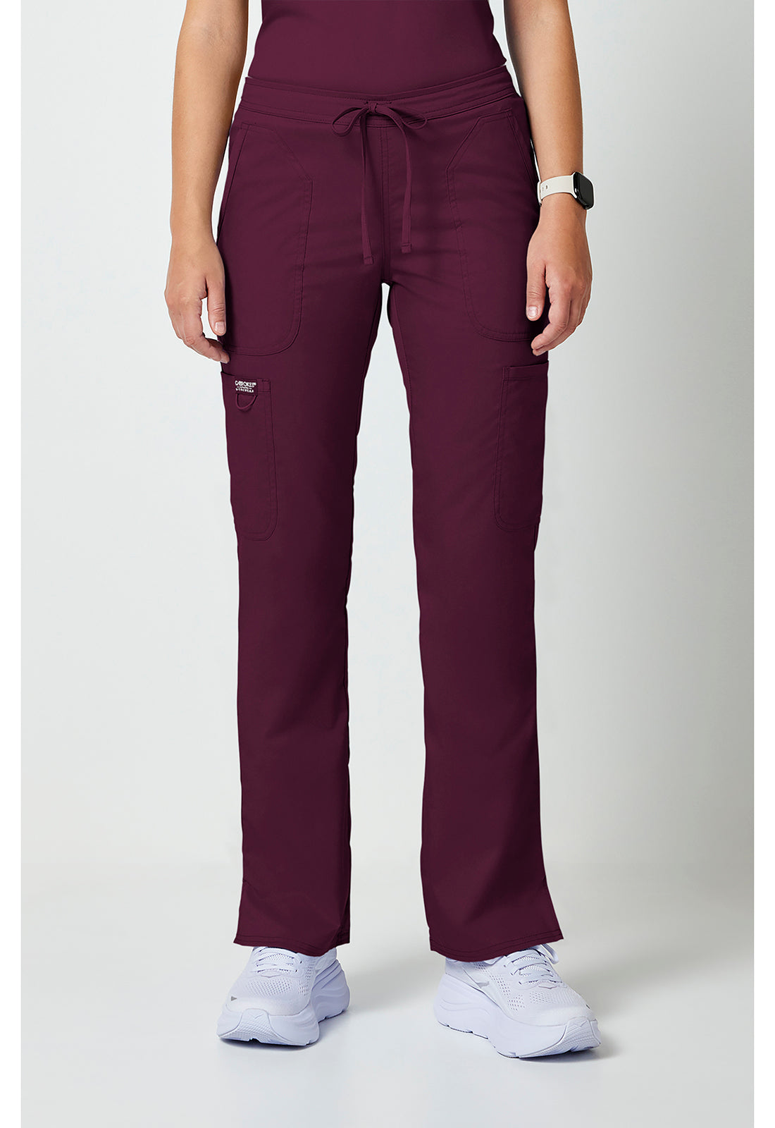 Mid-rise jeans met gematigde uitlopende pijpen en trekkoord met cargozakken en 2-way stretch WWE120