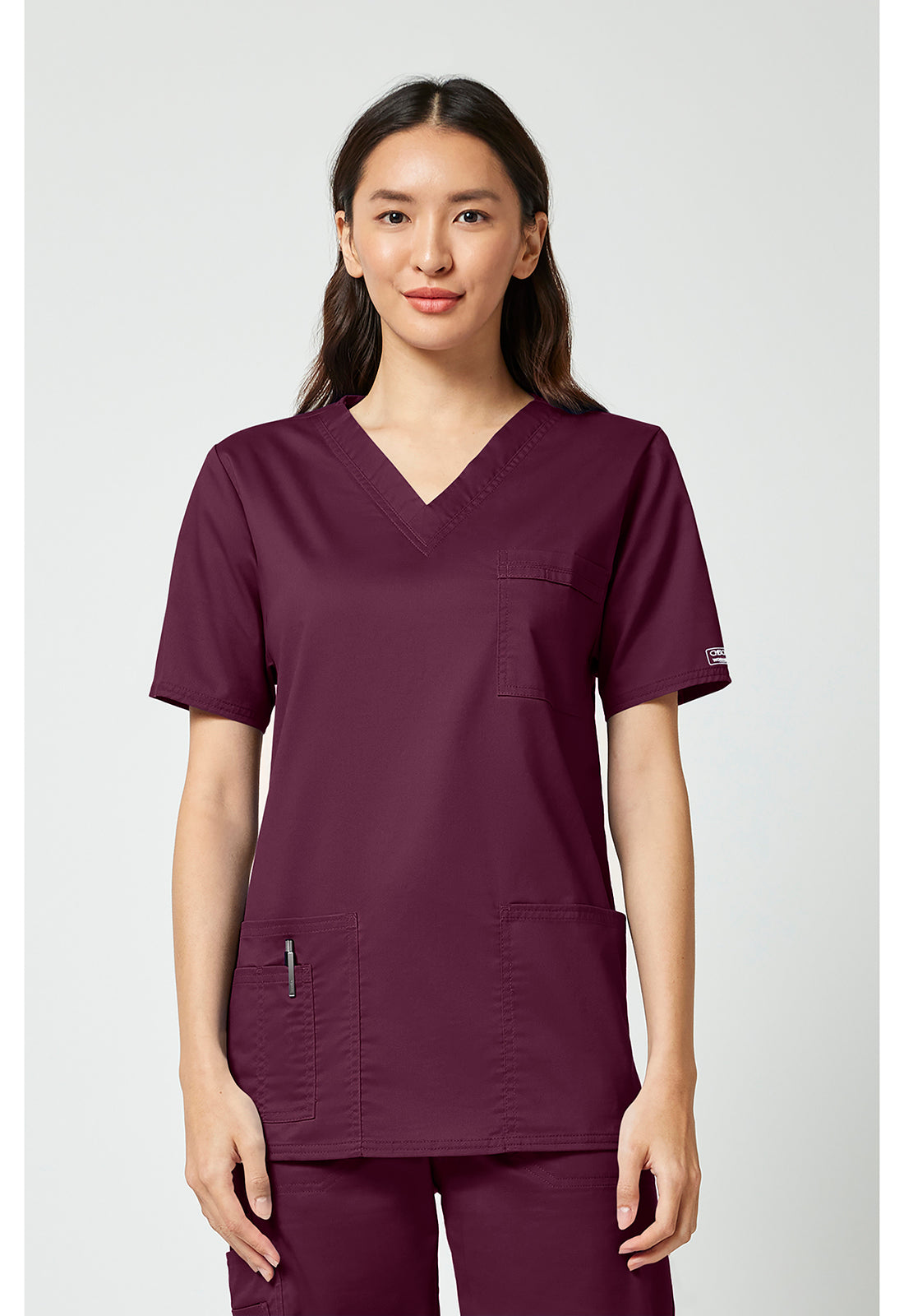 Unisex V-hals top met traditionele pasvorm en 2-way stretch