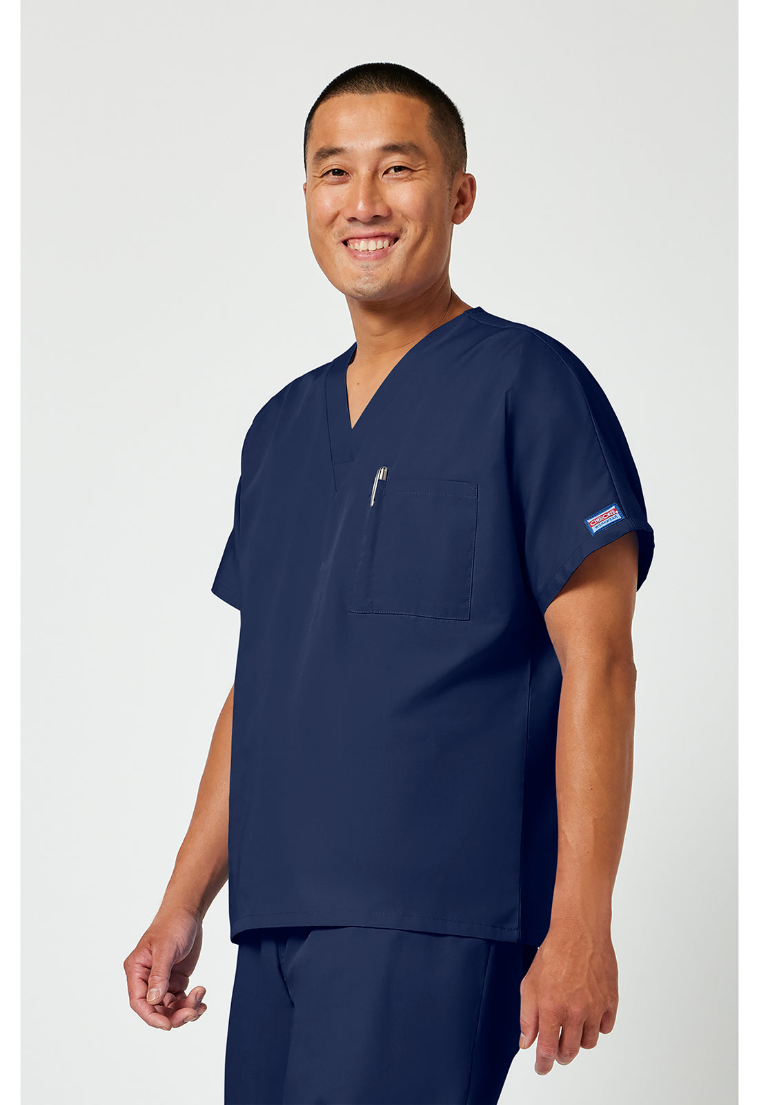 Cherokee Workwear Unisex tuniek met V-hals met vleermuismouwen en borstzak WWE4777