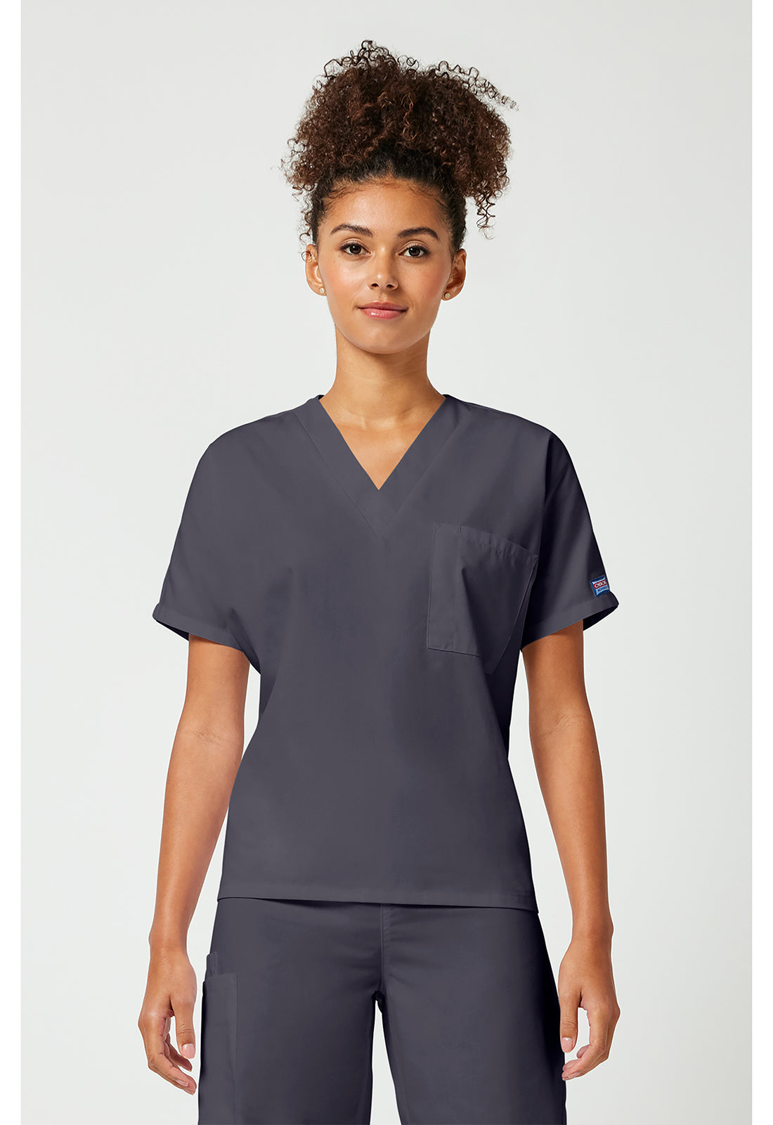 Cherokee Workwear Unisex tuniek met V-hals met vleermuismouwen en borstzak WWE4777