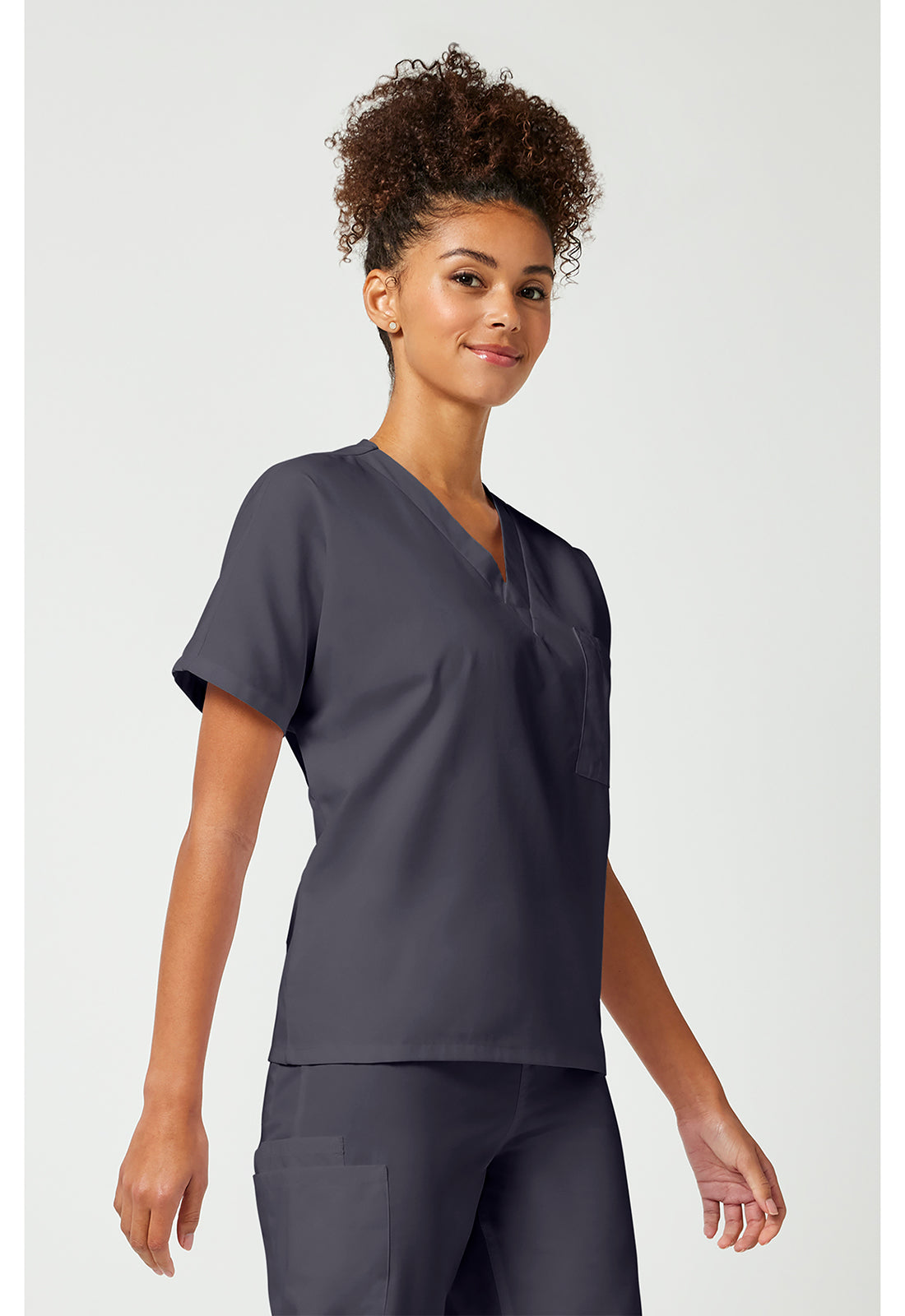 Cherokee Workwear Unisex tuniek met V-hals met vleermuismouwen en borstzak WWE4777