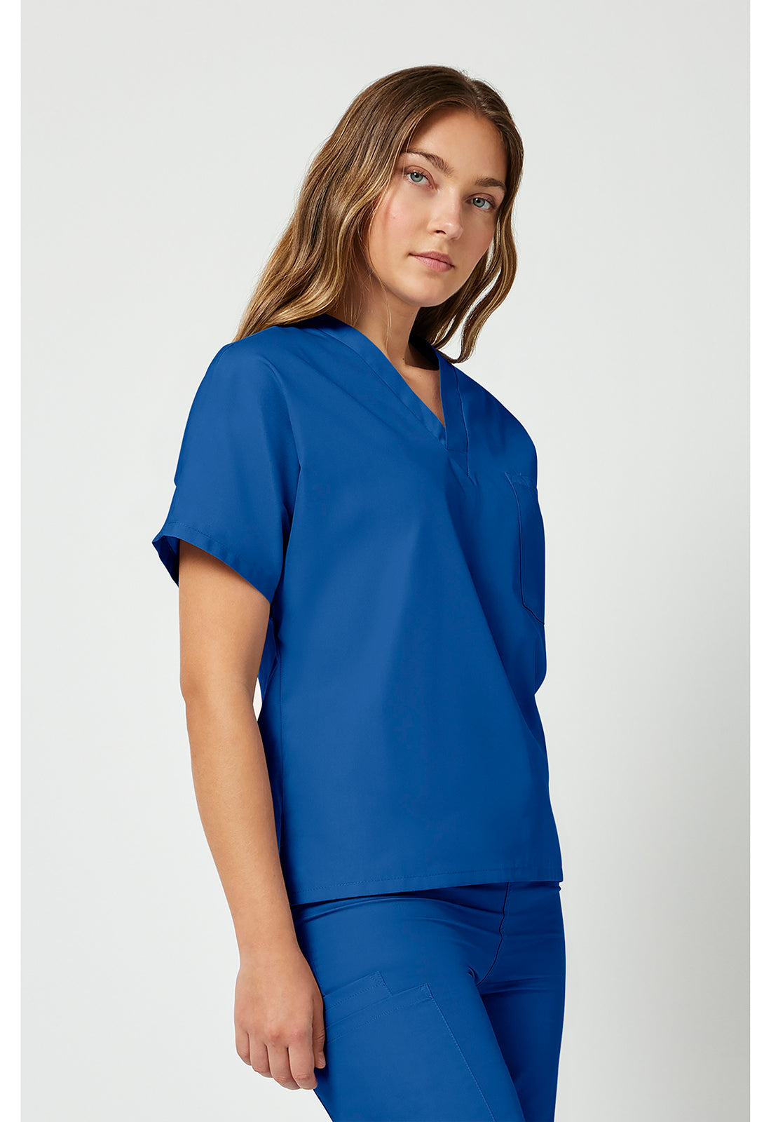 Cherokee Workwear Unisex tuniek met V-hals met vleermuismouwen en borstzak WWE4777